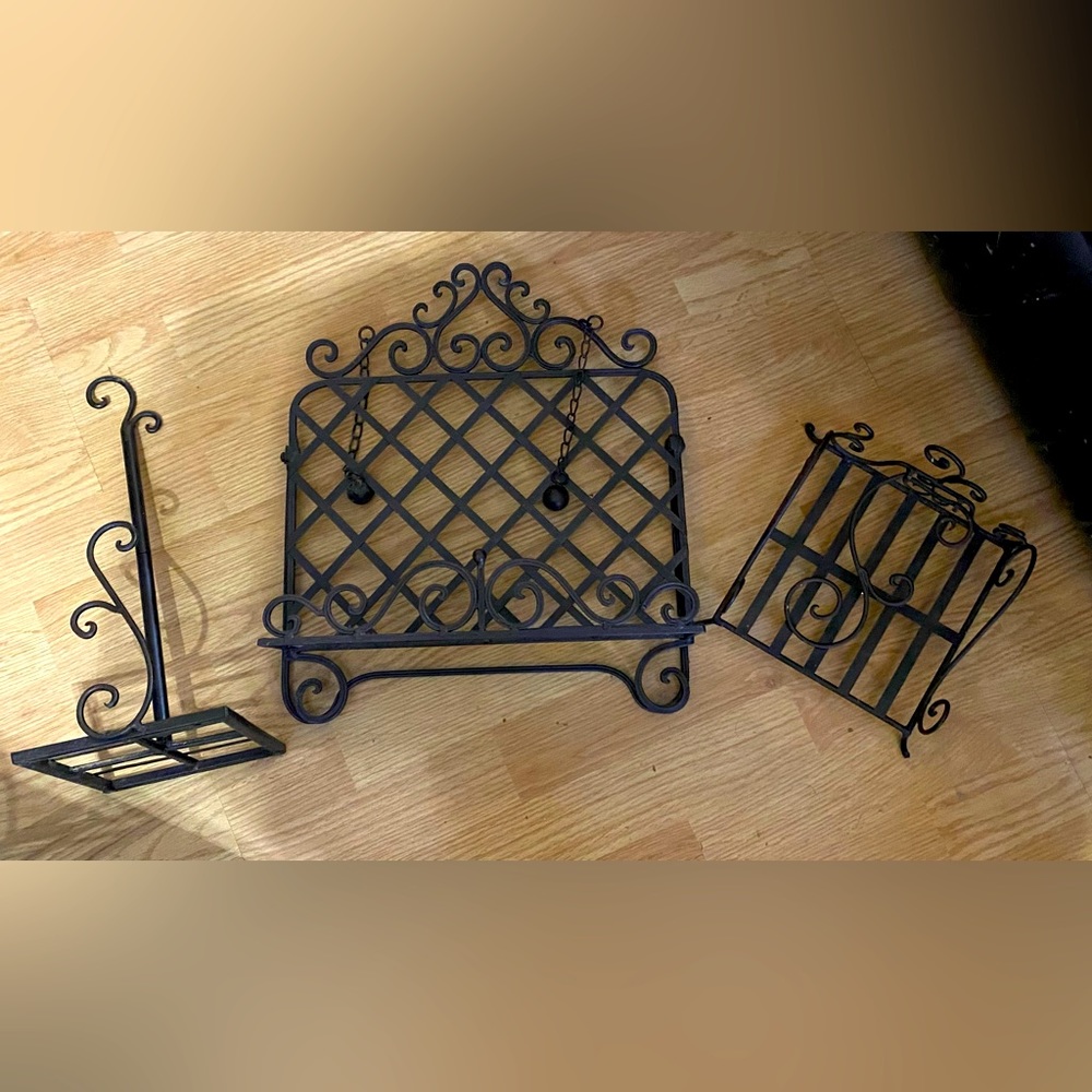 Home Interiors cook book holder with weights, paper towel holder, napkin holder.
